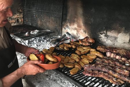 Argentinian making asado